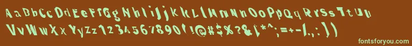 フォントThroughtheblacknarlefta – 緑色の文字が茶色の背景にあります。