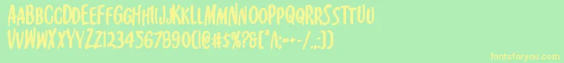 フォントKennebunkportbold – 黄色の文字が緑の背景にあります