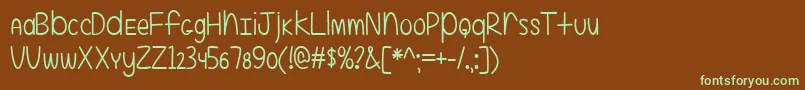フォントEvenMoreMixedUp2 – 緑色の文字が茶色の背景にあります。