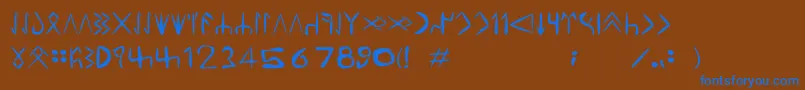 TuzlucaTdd Font – Blue Fonts on Brown Background