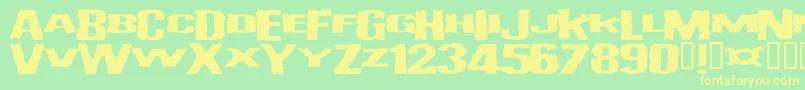 Vulgardisplayofpower-fontti – keltaiset fontit vihreällä taustalla