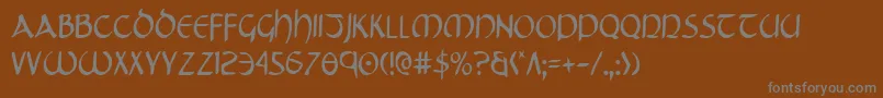 Tristramc Font – Gray Fonts on Brown Background