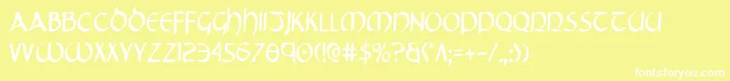 フォントTristramc – 黄色い背景に白い文字