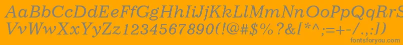 ImpressumLtItalic-fontti – harmaat kirjasimet oranssilla taustalla