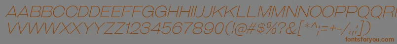 フォントGalderglynnTitlingElIt – 茶色の文字が灰色の背景にあります。