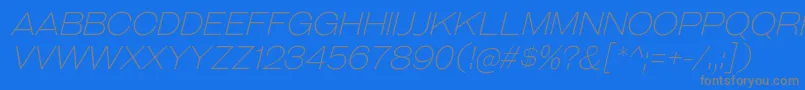 GalderglynnTitlingElIt-fontti – harmaat kirjasimet sinisellä taustalla