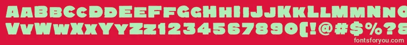Quadratgroteskblackc Font – Green Fonts on Red Background
