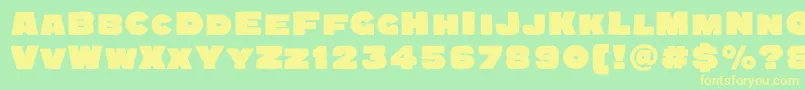 Quadratgroteskblackc Font – Yellow Fonts on Green Background