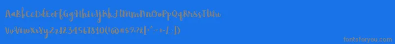 BmdAvocadoLime-Schriftart – Graue Schriften auf blauem Hintergrund