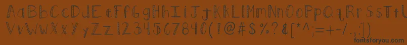 Kbpush Font – Black Fonts on Brown Background