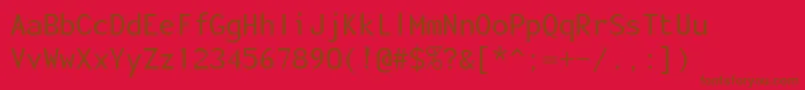 Enola-fontti – ruskeat fontit punaisella taustalla