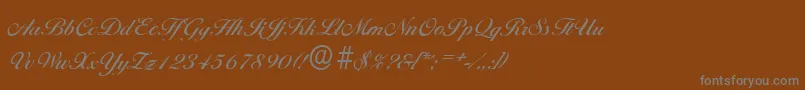 BallantinesserialMediumRegular Font – Gray Fonts on Brown Background