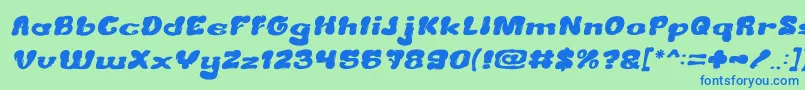 CreamyButterItalic-Schriftart – Blaue Schriften auf grünem Hintergrund