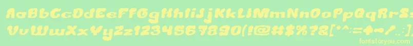 CreamyButterItalic Font – Yellow Fonts on Green Background