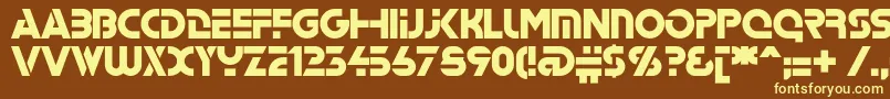 Stenc-fontti – keltaiset fontit ruskealla taustalla