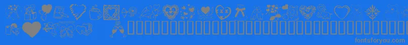 Czcionka KrValentineDings2002 – szare czcionki na niebieskim tle