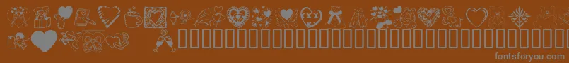 Fonte KrValentineDings2002 – fontes cinzas em um fundo marrom