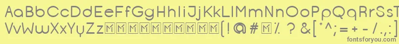 OpificioRounded-fontti – harmaat kirjasimet keltaisella taustalla