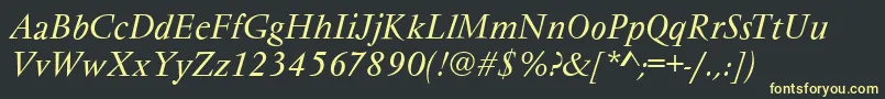 フォントVarennesItalic – 黒い背景に黄色の文字
