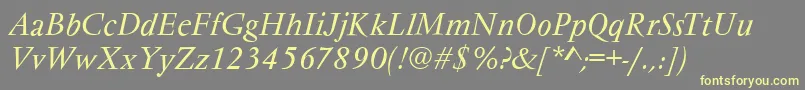 フォントVarennesItalic – 黄色のフォント、灰色の背景