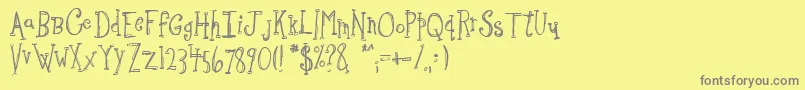 フォントSketchbo – 黄色の背景に灰色の文字