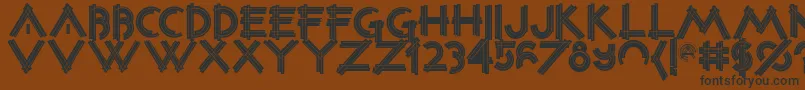 Constrxiablackinline-fontti – mustat fontit ruskealla taustalla