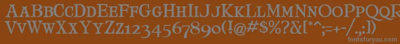 MaryJaneSmallCaps Font – Gray Fonts on Brown Background