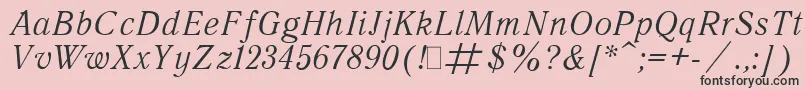 フォントQuantAntiquaItalic.001.001 – ピンクの背景に黒い文字