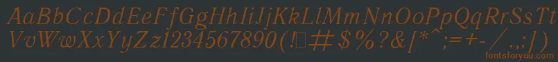 Шрифт QuantAntiquaItalic.001.001 – коричневые шрифты на чёрном фоне