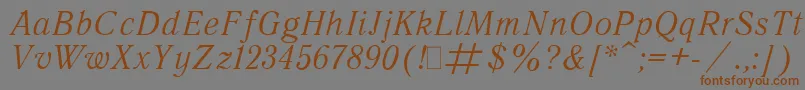 Шрифт QuantAntiquaItalic.001.001 – коричневые шрифты на сером фоне
