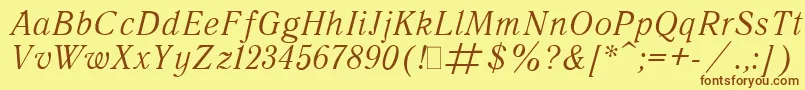 Шрифт QuantAntiquaItalic.001.001 – коричневые шрифты на жёлтом фоне