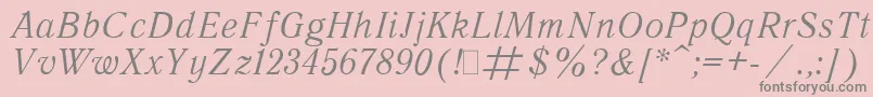 フォントQuantAntiquaItalic.001.001 – ピンクの背景に灰色の文字