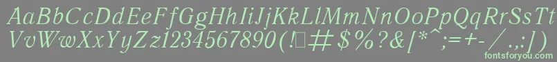 フォントQuantAntiquaItalic.001.001 – 灰色の背景に緑のフォント