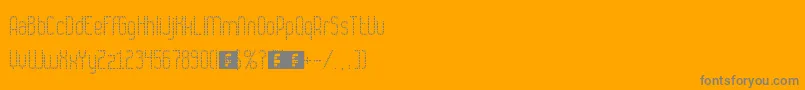 Numbat-fontti – harmaat kirjasimet oranssilla taustalla