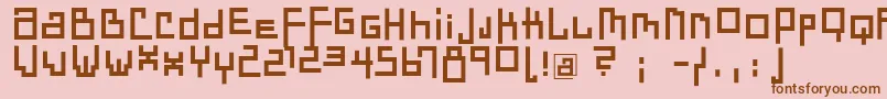 フォントDadastracesBold – ピンクの背景に茶色のフォント