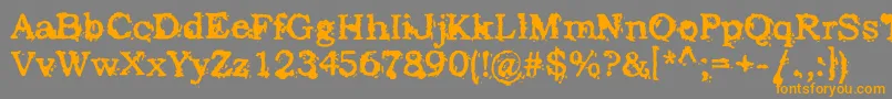 フォントStruckDead – オレンジの文字は灰色の背景にあります。