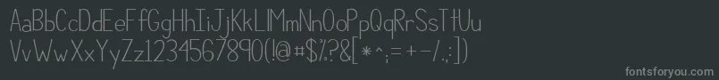 フォントKgcompassionsimple – 黒い背景に灰色の文字