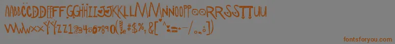 Шрифт ScManipulativeLoversDemo – коричневые шрифты на сером фоне