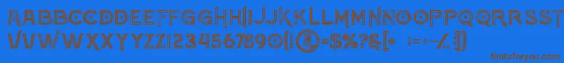 Fonte Atlantisinlinegrunge – fontes marrons em um fundo azul