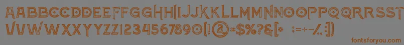 フォントAtlantisinlinegrunge – 茶色の文字が灰色の背景にあります。
