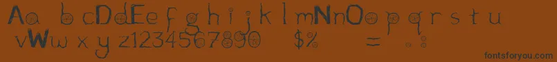 Wooden-Schriftart – Schwarze Schriften auf braunem Hintergrund