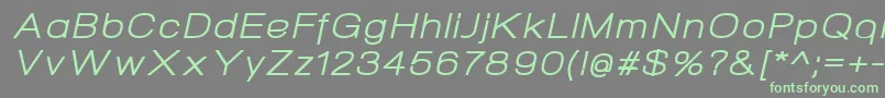 NeogramItalicextd-Schriftart – Grüne Schriften auf grauem Hintergrund