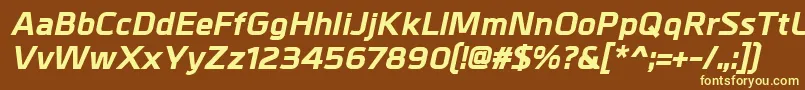MetrikExtrabolditalic-fontti – keltaiset fontit ruskealla taustalla