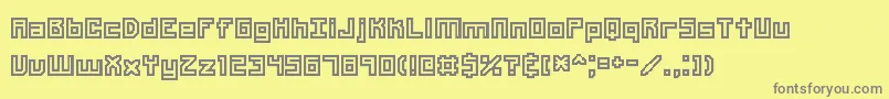 フォントUnlearne – 黄色の背景に灰色の文字
