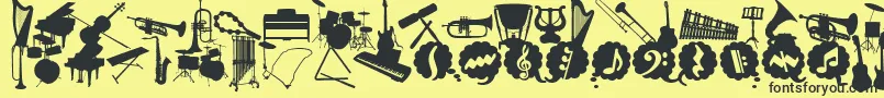 フォントWcMusicaBta – 黒い文字の黄色い背景