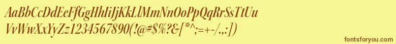 フォントKeplerstdSemiboldcnitdisp – 茶色の文字が黄色の背景にあります。