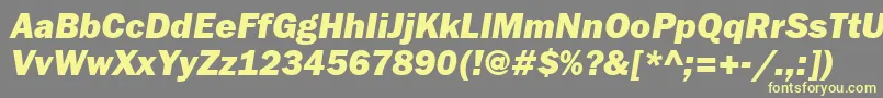 FranklingothheavyettItalic Font – Yellow Fonts on Gray Background