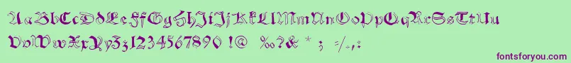 Schwabachscribbels-Schriftart – Violette Schriften auf grünem Hintergrund