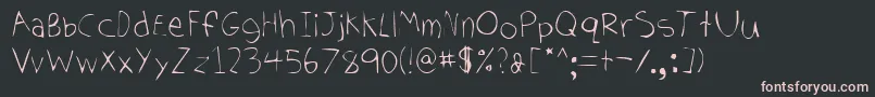 フォントTomhand – 黒い背景にピンクのフォント