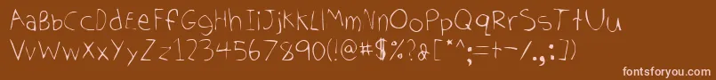 Czcionka Tomhand – różowe czcionki na brązowym tle